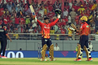 Priyansh Arya of Punjab Kings raises his bat after scoring a hundred against Chennai Super Kings at Mullanpur. (Express Photo by Kamleshwar Singh)